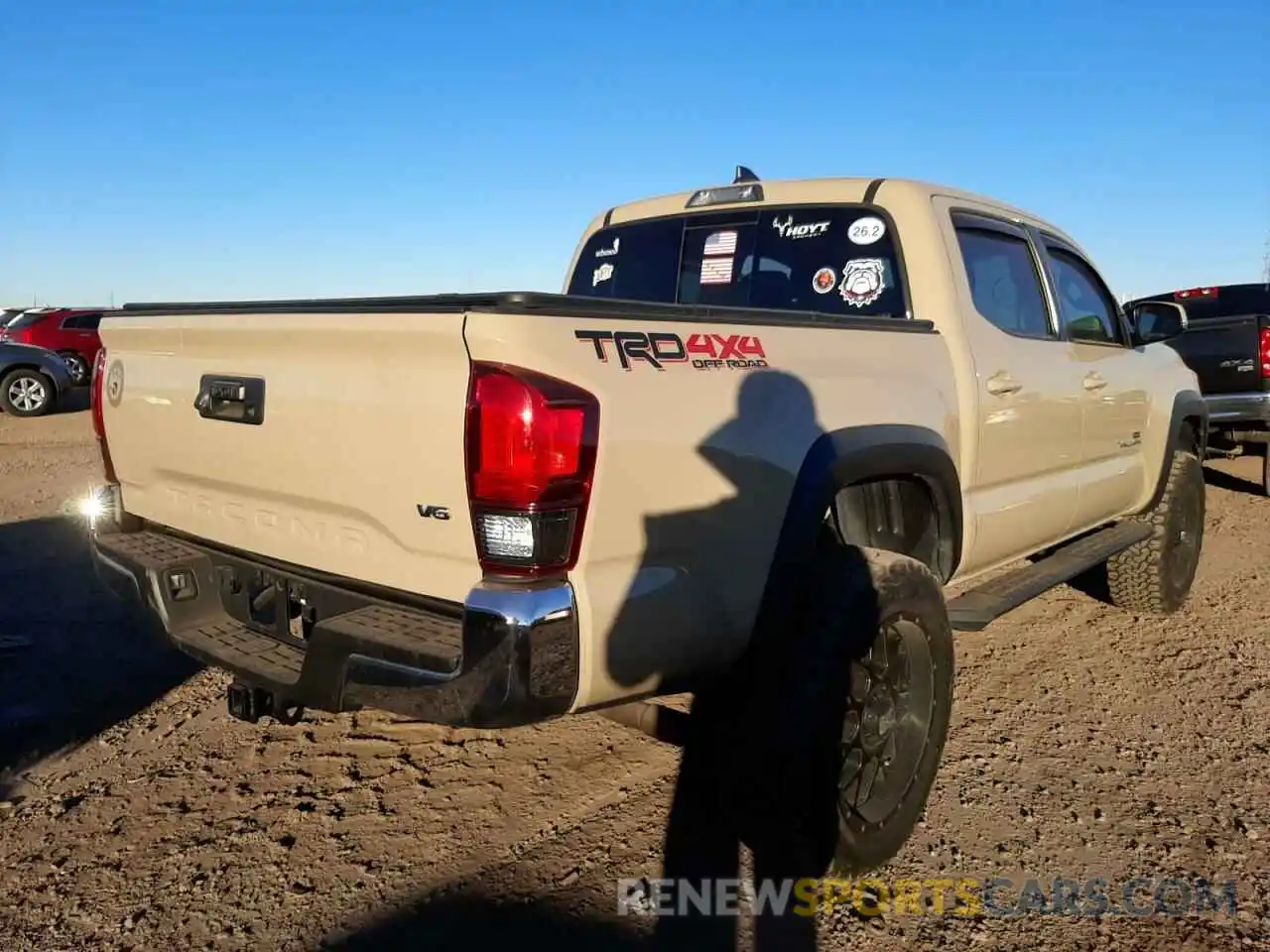 4 Photograph of a damaged car 3TMCZ5AN2KM223943 TOYOTA TACOMA 2019