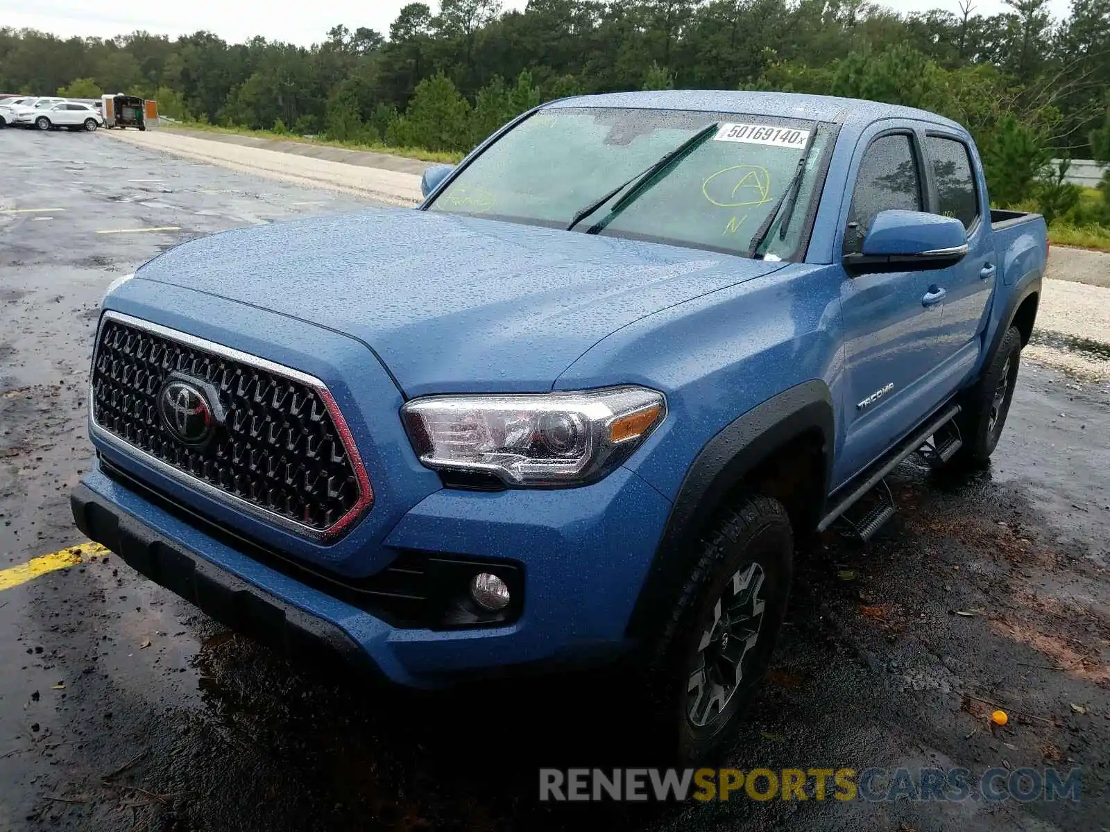 2 Photograph of a damaged car 3TMCZ5AN2KM224946 TOYOTA TACOMA 2019