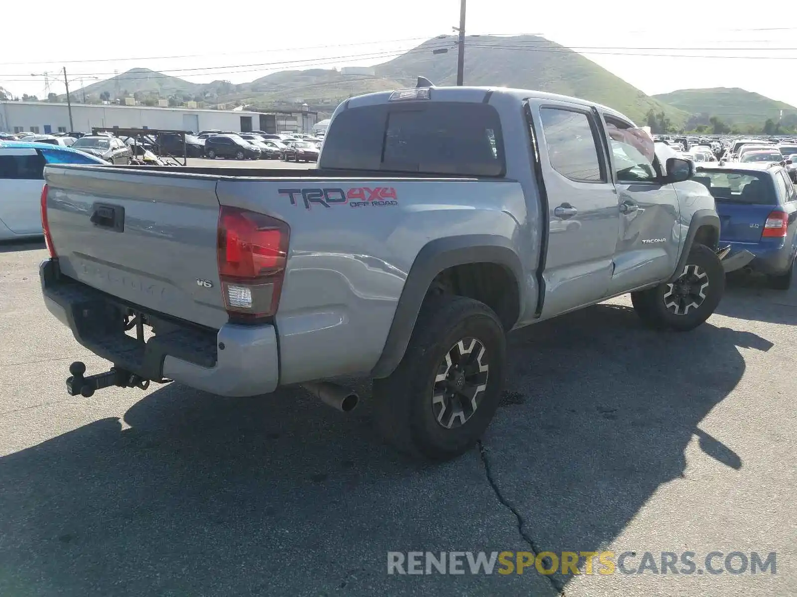 4 Photograph of a damaged car 3TMCZ5AN2KM227801 TOYOTA TACOMA 2019