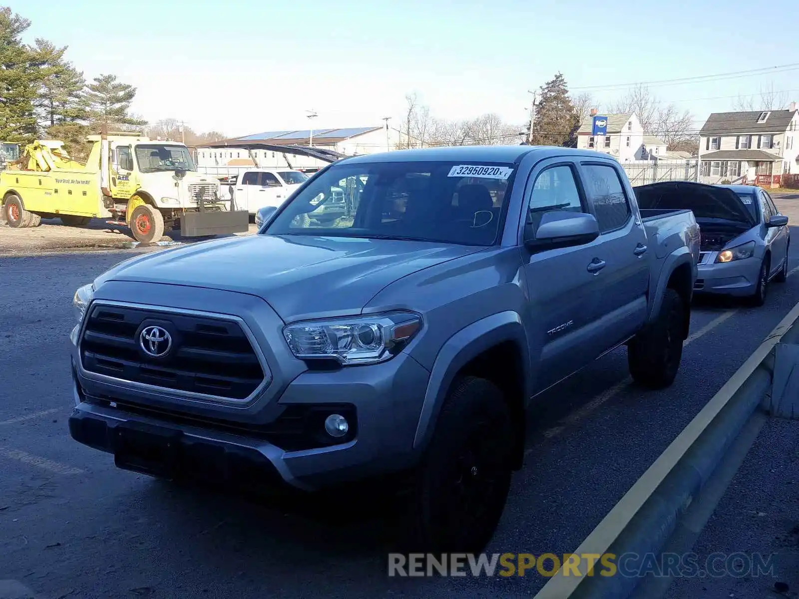 2 Photograph of a damaged car 3TMCZ5AN2KM227927 TOYOTA TACOMA 2019