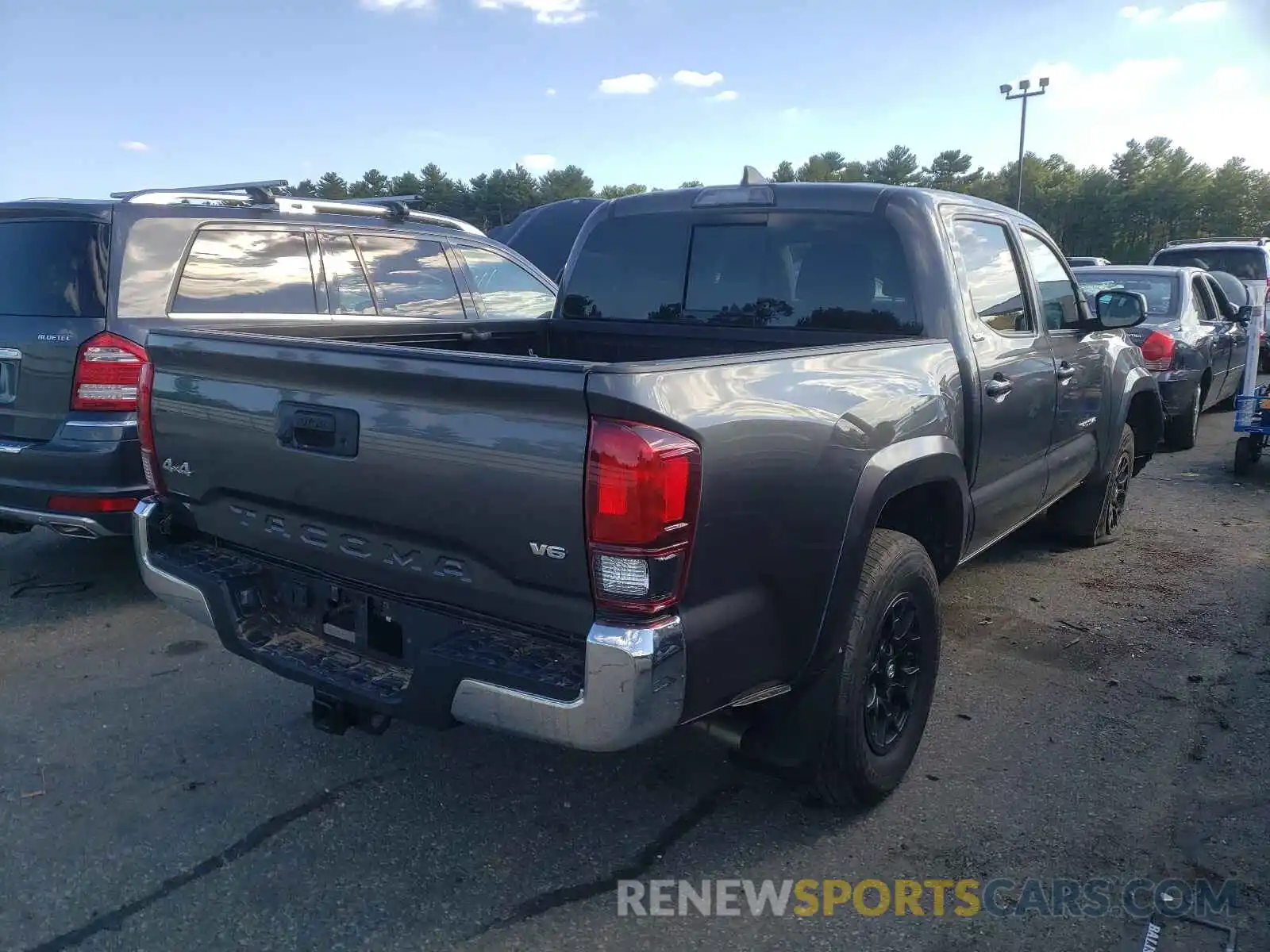 4 Photograph of a damaged car 3TMCZ5AN2KM230312 TOYOTA TACOMA 2019