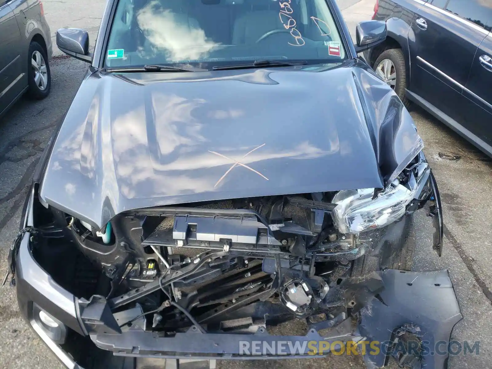 7 Photograph of a damaged car 3TMCZ5AN2KM230312 TOYOTA TACOMA 2019