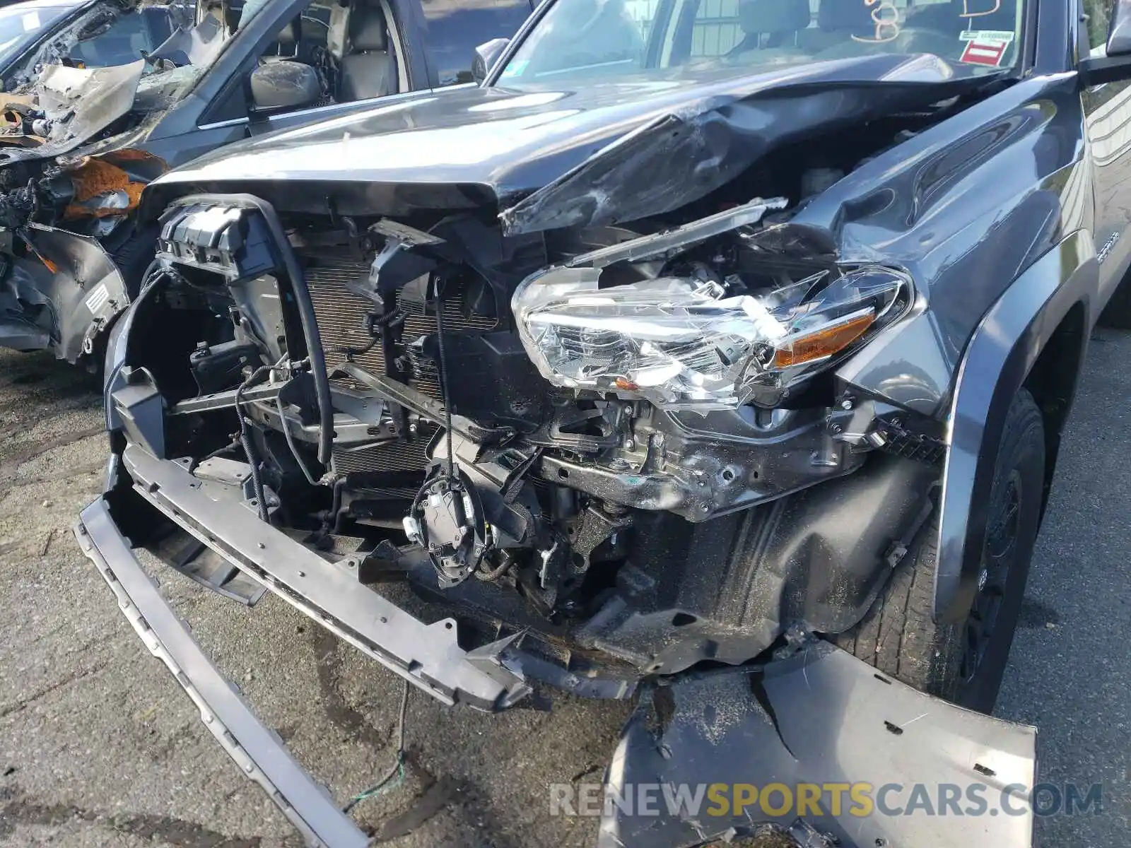 9 Photograph of a damaged car 3TMCZ5AN2KM230312 TOYOTA TACOMA 2019