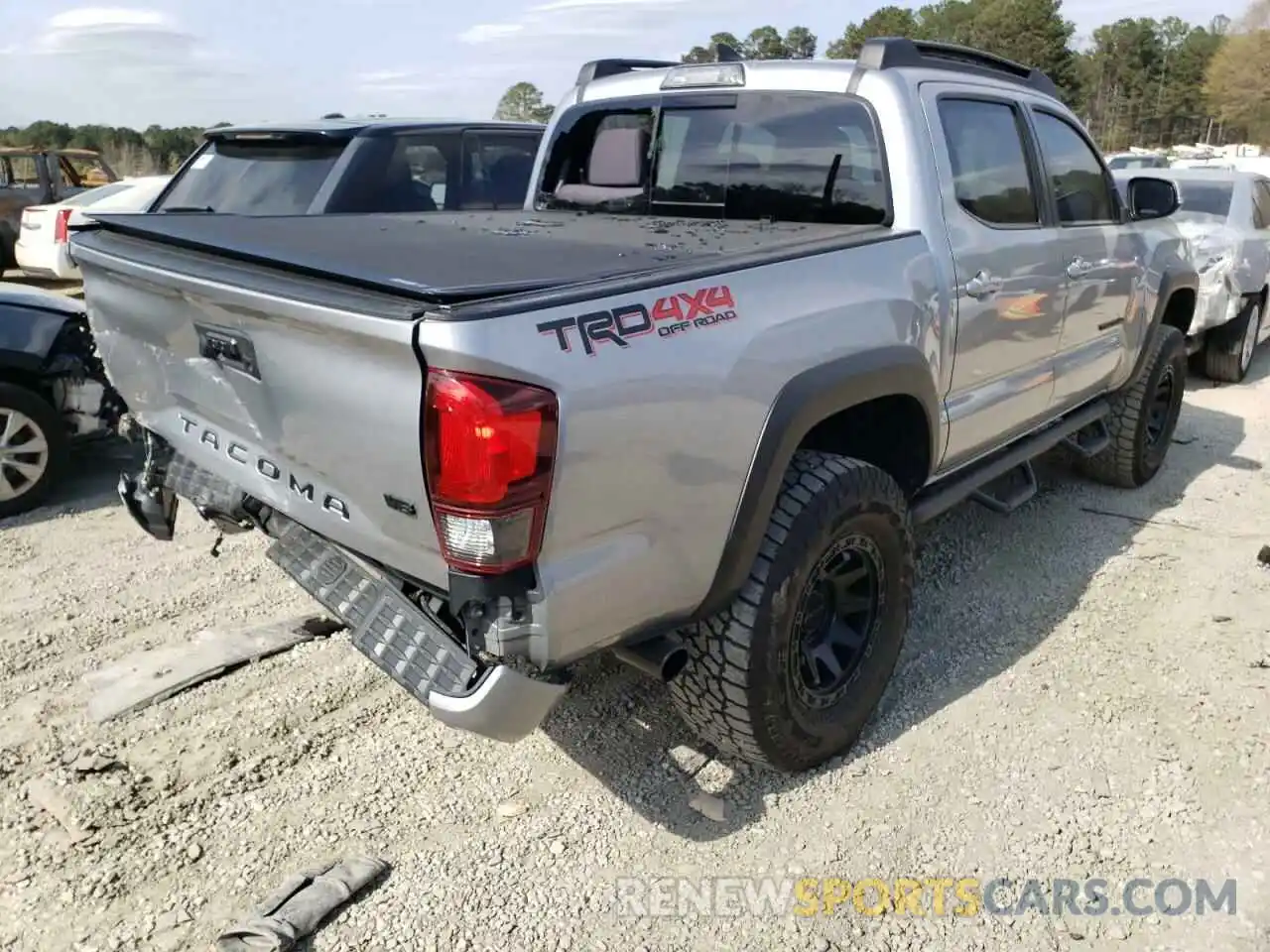 4 Photograph of a damaged car 3TMCZ5AN2KM230603 TOYOTA TACOMA 2019