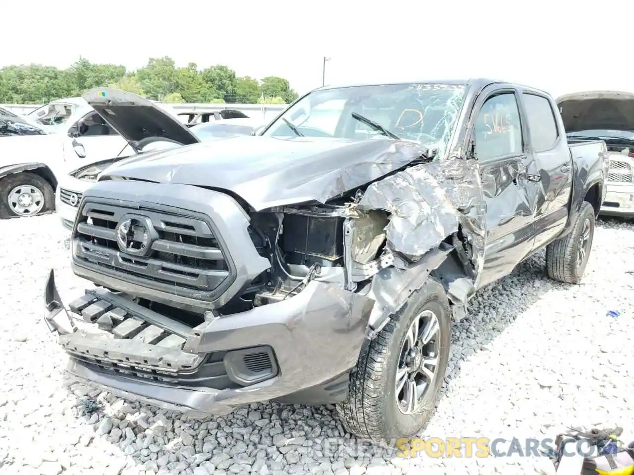 2 Photograph of a damaged car 3TMCZ5AN2KM232626 TOYOTA TACOMA 2019