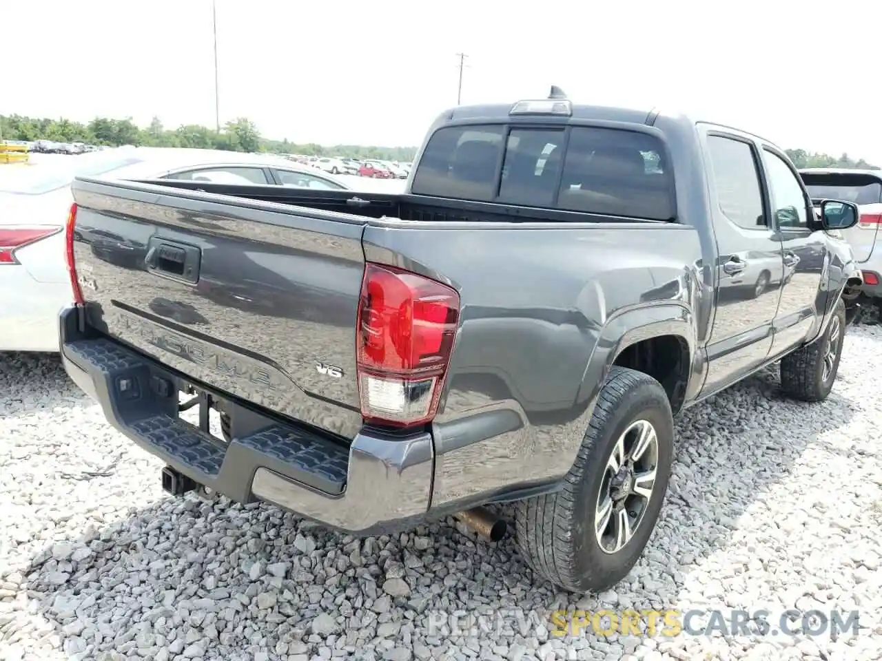 4 Photograph of a damaged car 3TMCZ5AN2KM232626 TOYOTA TACOMA 2019