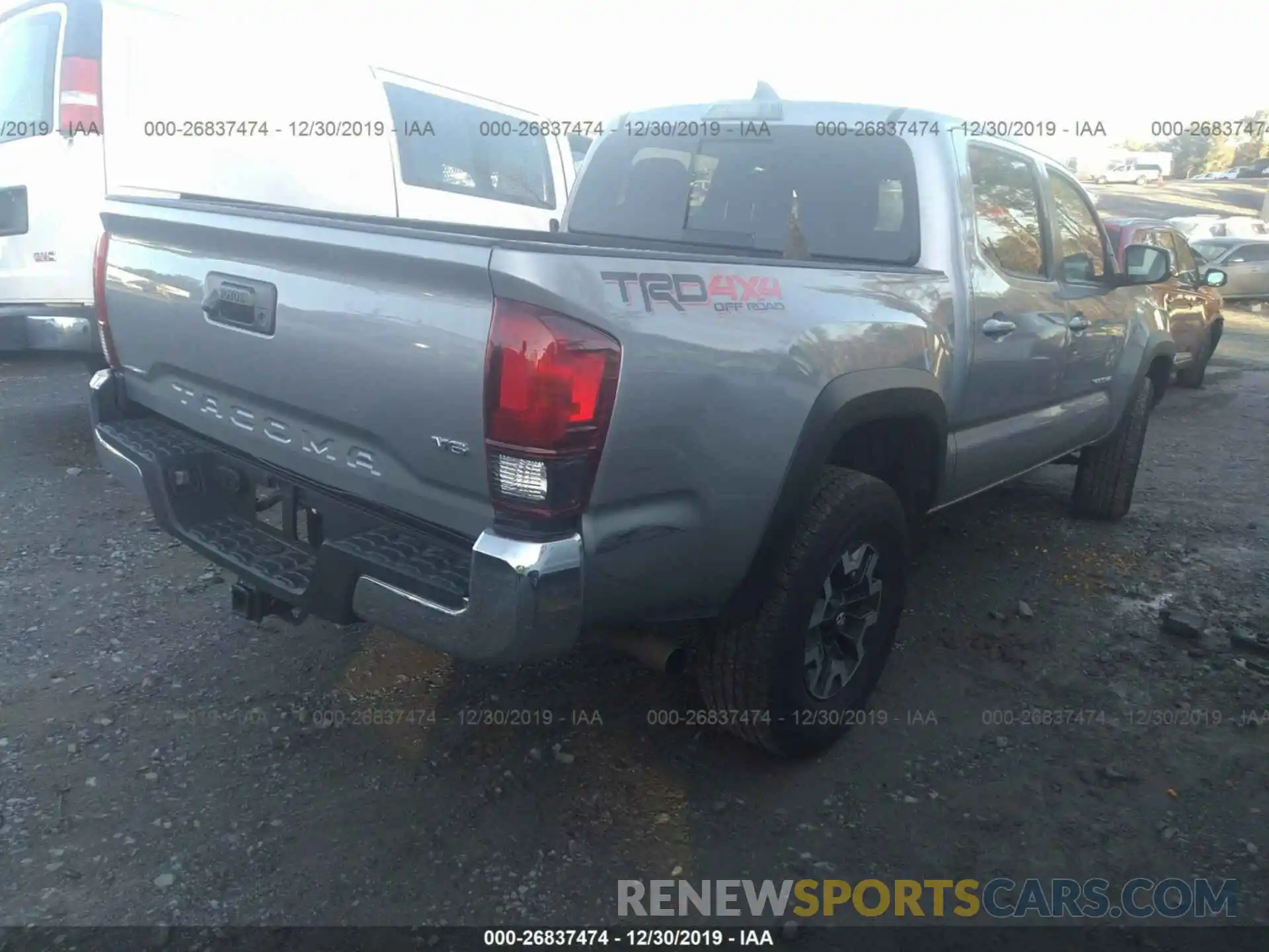 4 Photograph of a damaged car 3TMCZ5AN2KM235073 TOYOTA TACOMA 2019