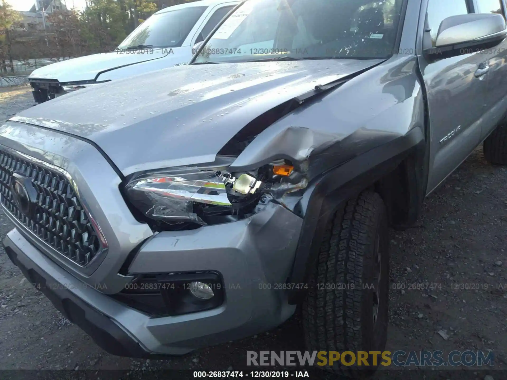 6 Photograph of a damaged car 3TMCZ5AN2KM235073 TOYOTA TACOMA 2019