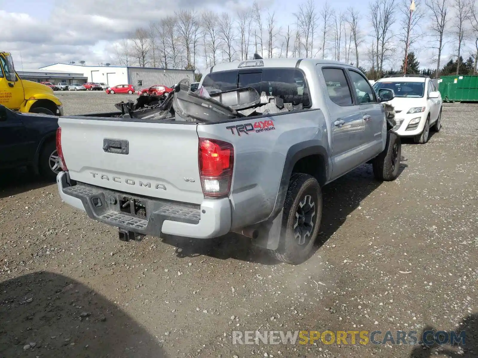 4 Photograph of a damaged car 3TMCZ5AN2KM237213 TOYOTA TACOMA 2019