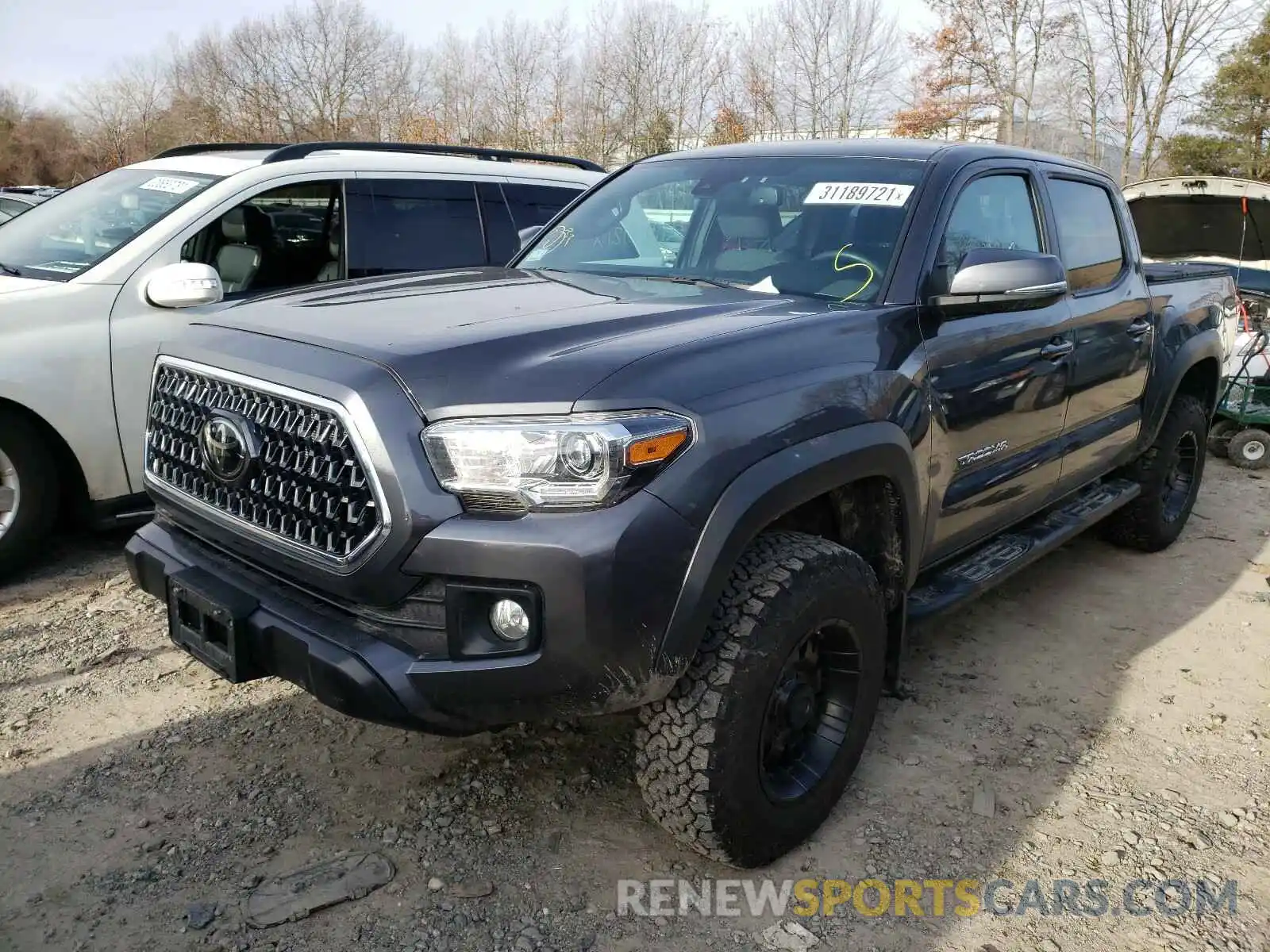 2 Photograph of a damaged car 3TMCZ5AN2KM237454 TOYOTA TACOMA 2019