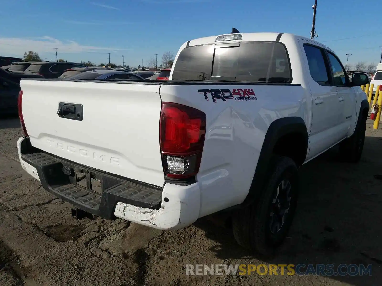 4 Photograph of a damaged car 3TMCZ5AN2KM237566 TOYOTA TACOMA 2019