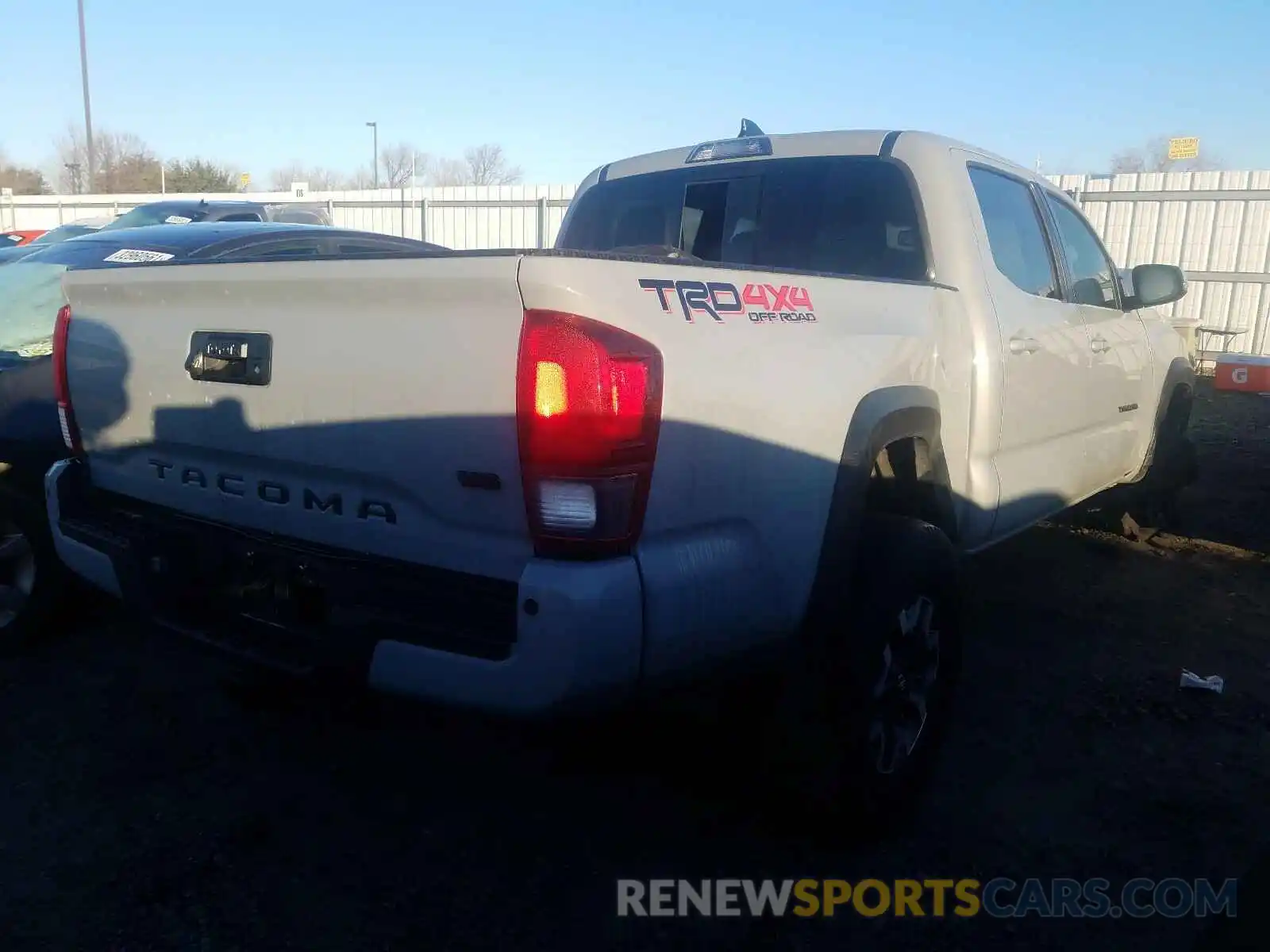 4 Photograph of a damaged car 3TMCZ5AN2KM237762 TOYOTA TACOMA 2019