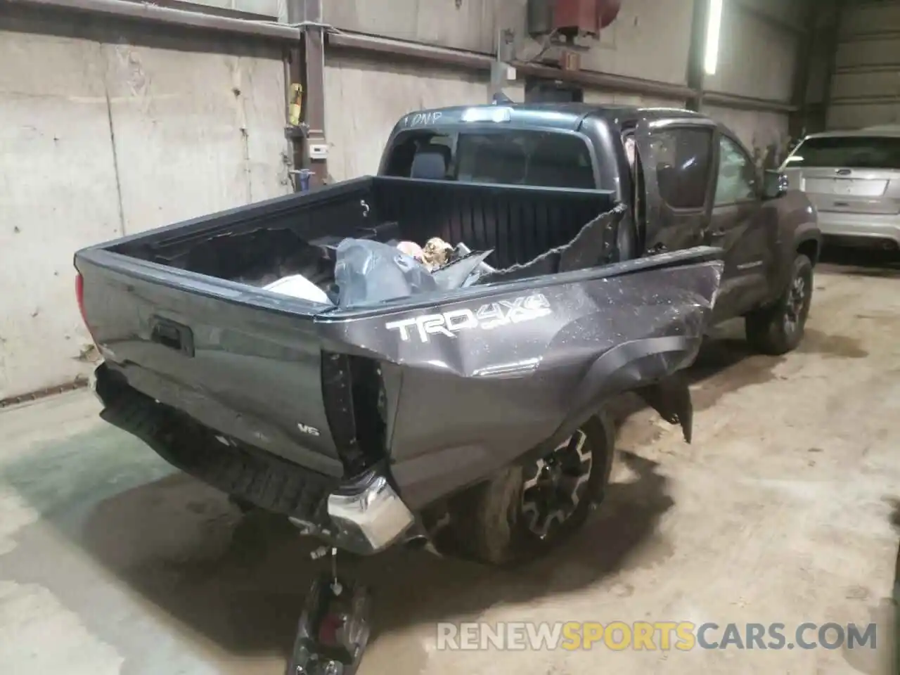 4 Photograph of a damaged car 3TMCZ5AN2KM238653 TOYOTA TACOMA 2019