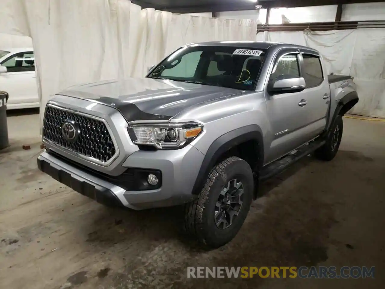 2 Photograph of a damaged car 3TMCZ5AN2KM239902 TOYOTA TACOMA 2019