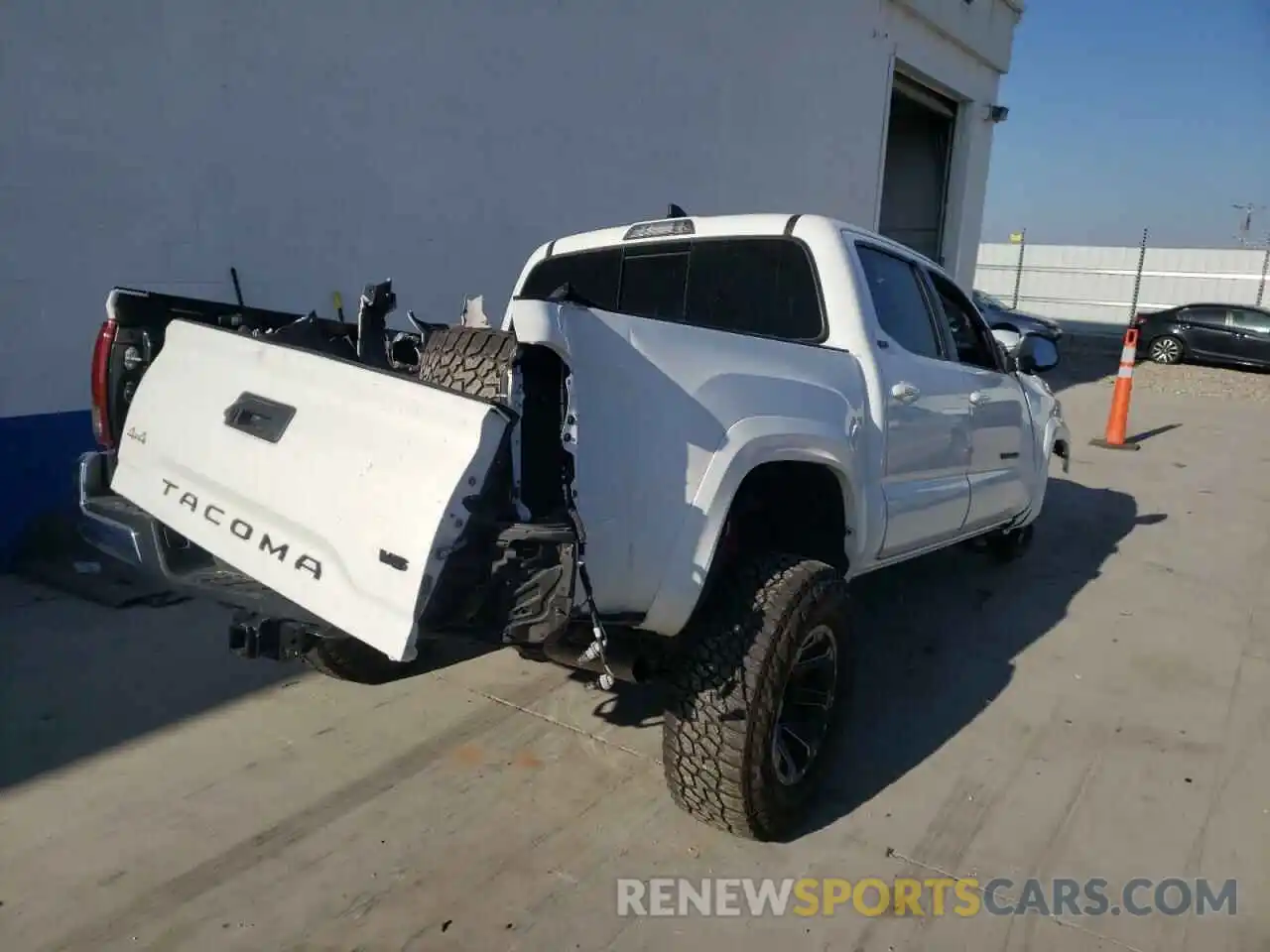 4 Photograph of a damaged car 3TMCZ5AN2KM240547 TOYOTA TACOMA 2019