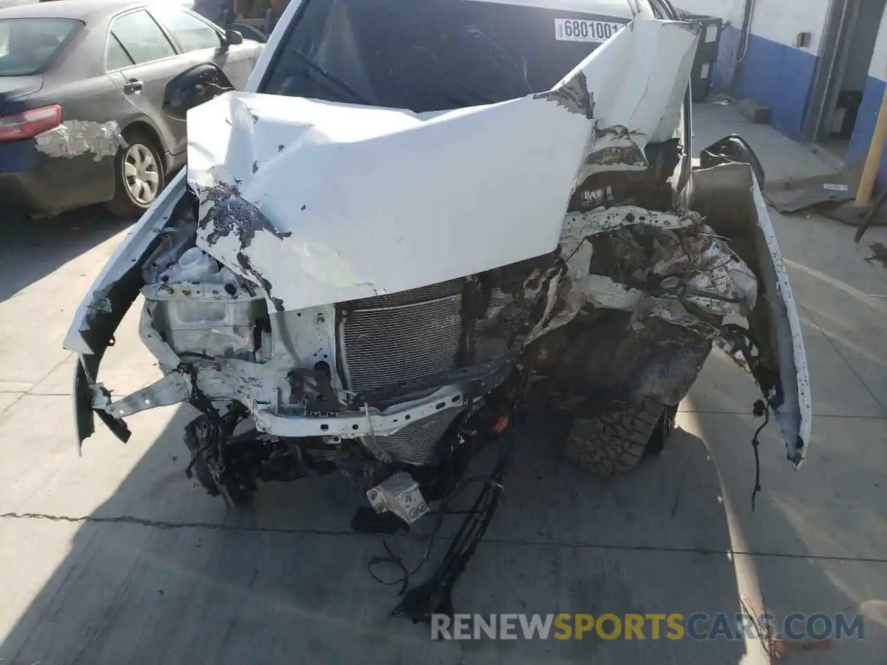 7 Photograph of a damaged car 3TMCZ5AN2KM240547 TOYOTA TACOMA 2019