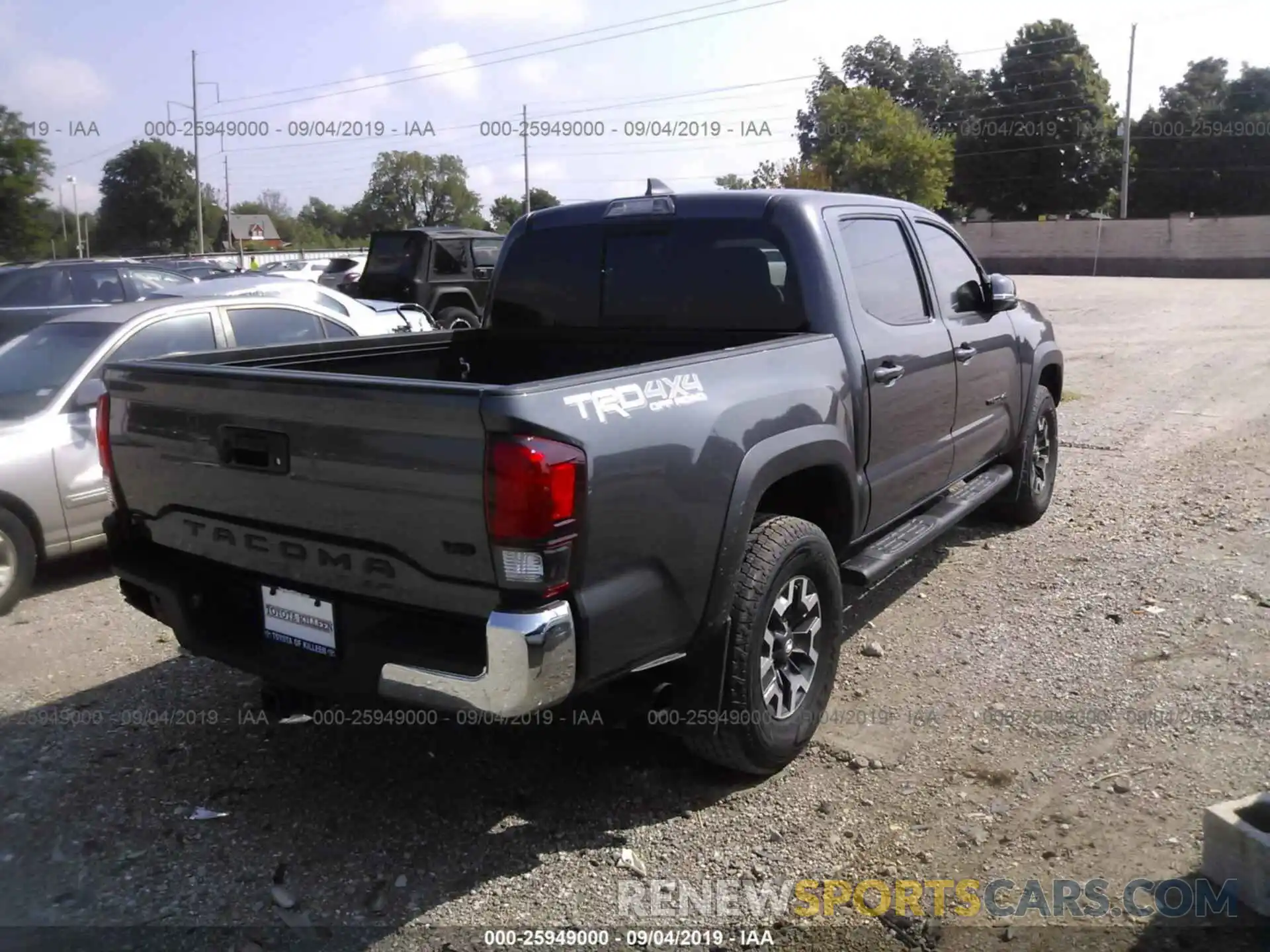 4 Photograph of a damaged car 3TMCZ5AN2KM243321 TOYOTA TACOMA 2019