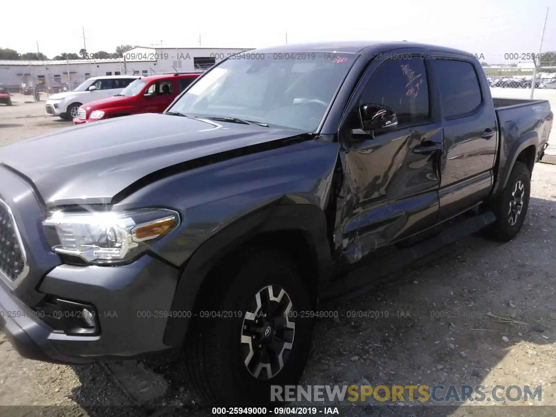 6 Photograph of a damaged car 3TMCZ5AN2KM243321 TOYOTA TACOMA 2019