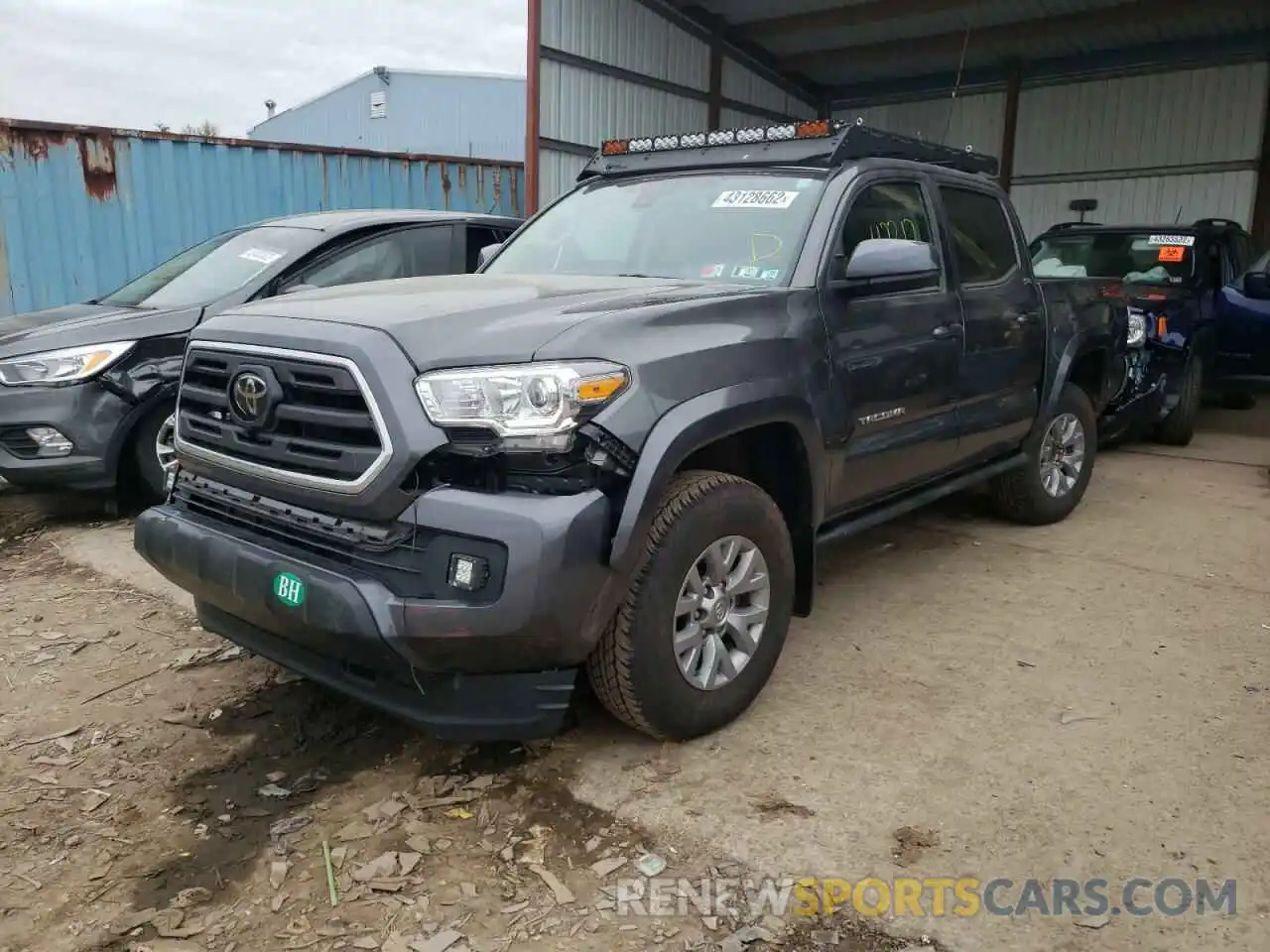 2 Photograph of a damaged car 3TMCZ5AN2KM243769 TOYOTA TACOMA 2019