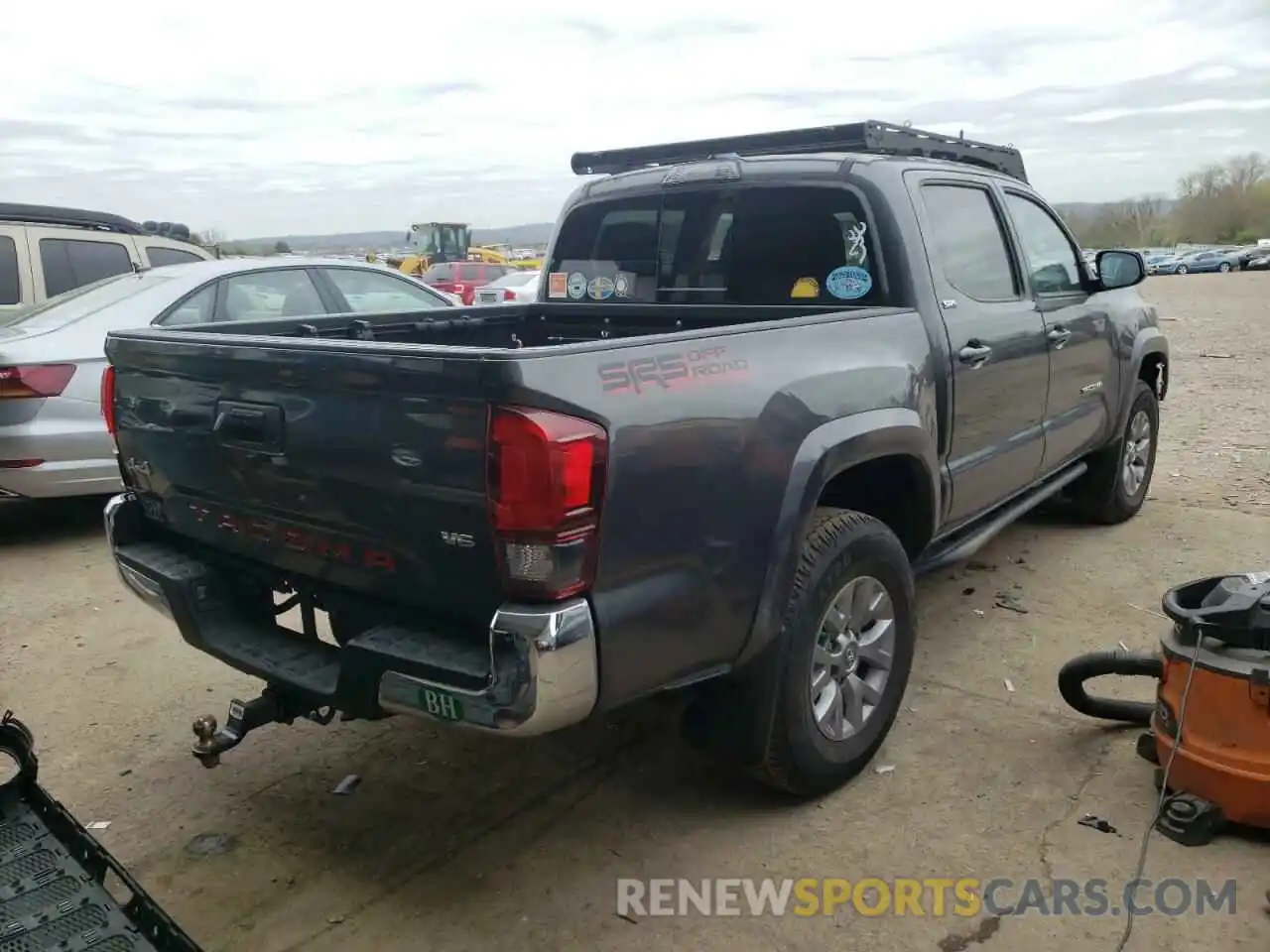 4 Photograph of a damaged car 3TMCZ5AN2KM243769 TOYOTA TACOMA 2019