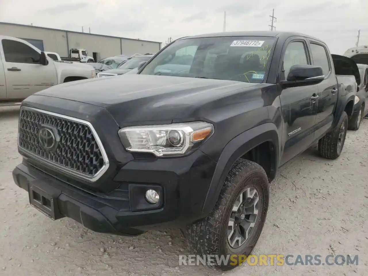 2 Photograph of a damaged car 3TMCZ5AN2KM245893 TOYOTA TACOMA 2019