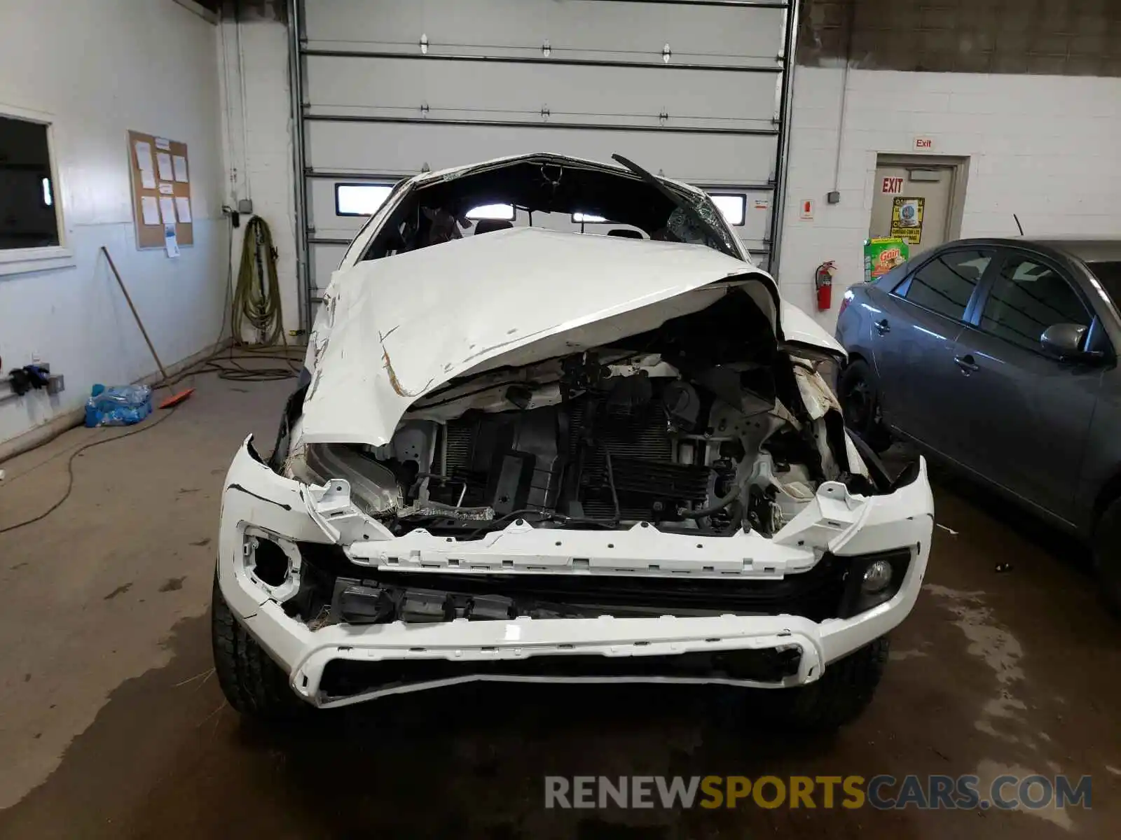 9 Photograph of a damaged car 3TMCZ5AN2KM246915 TOYOTA TACOMA 2019