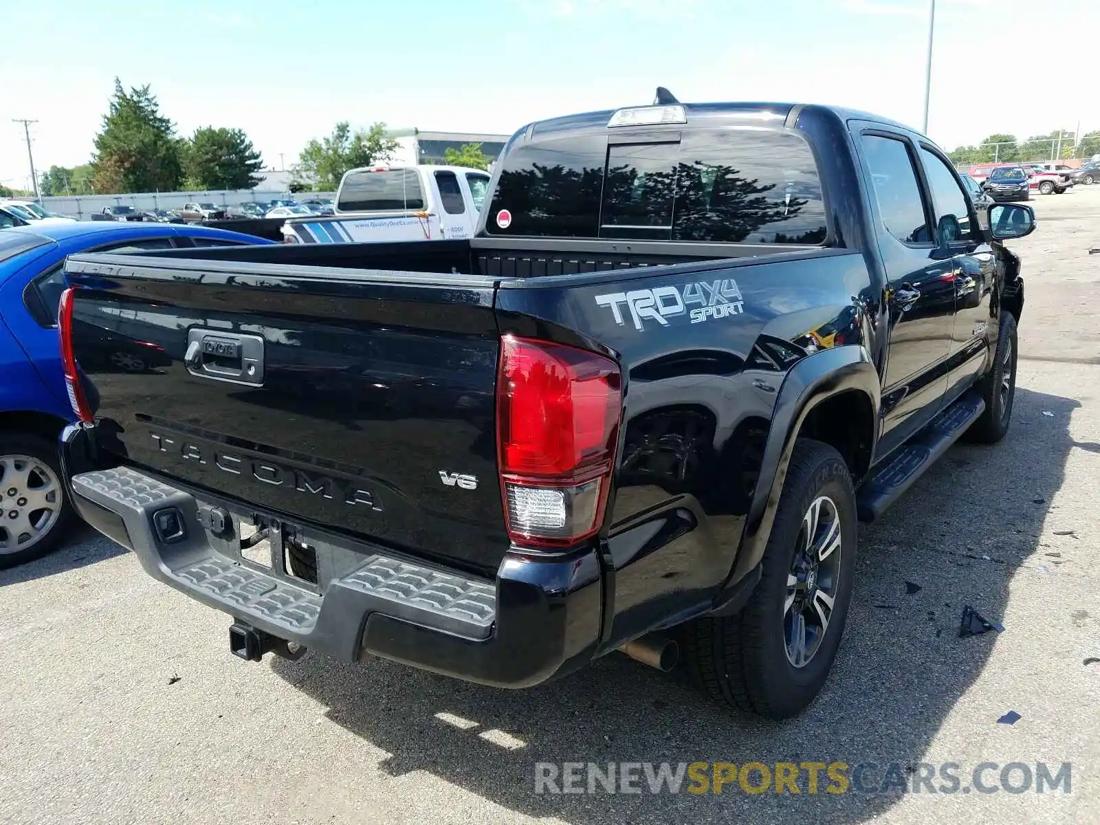 4 Photograph of a damaged car 3TMCZ5AN2KM250132 TOYOTA TACOMA 2019