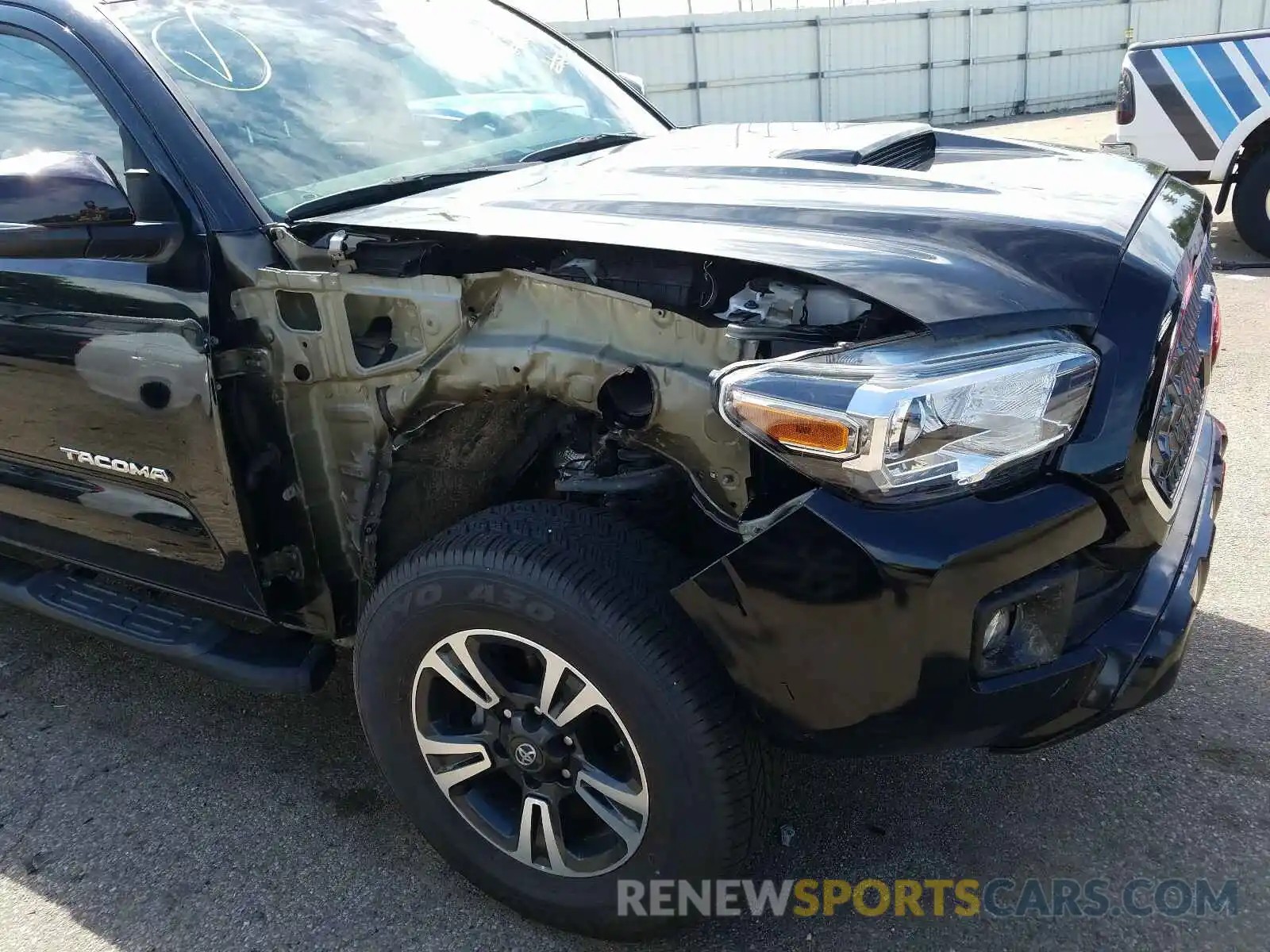 9 Photograph of a damaged car 3TMCZ5AN2KM250132 TOYOTA TACOMA 2019