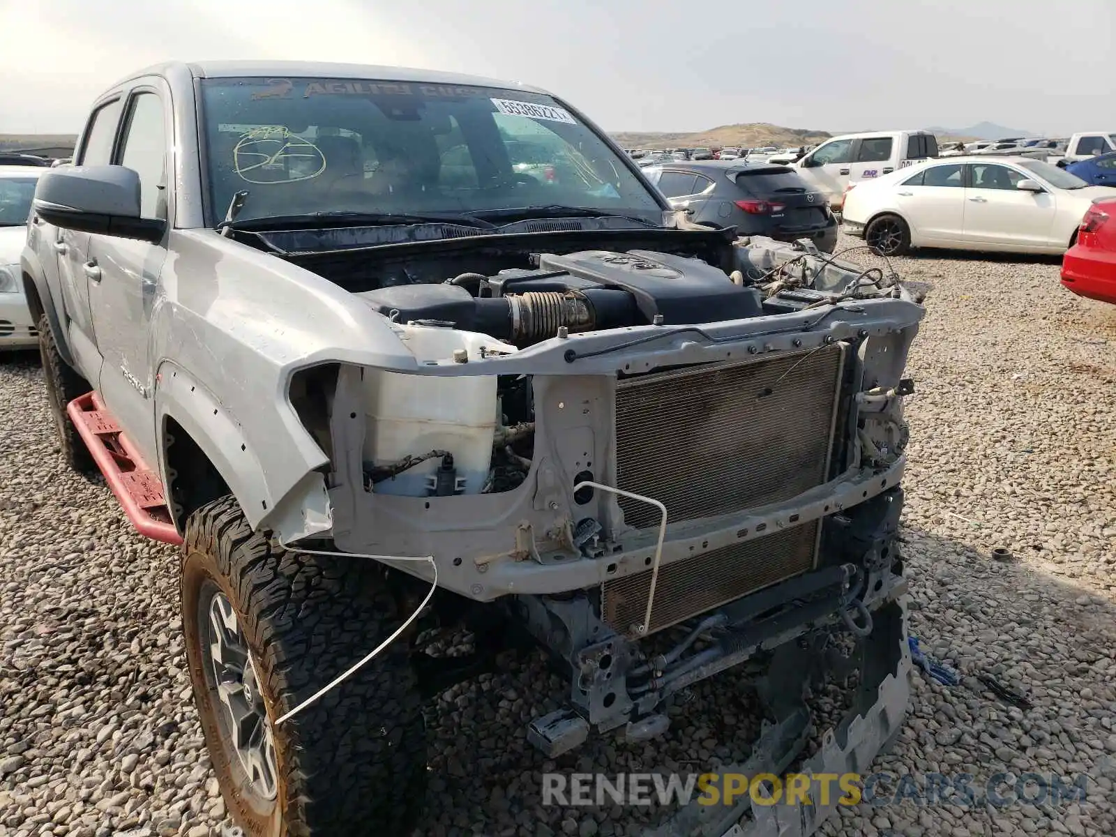 9 Photograph of a damaged car 3TMCZ5AN2KM252858 TOYOTA TACOMA 2019