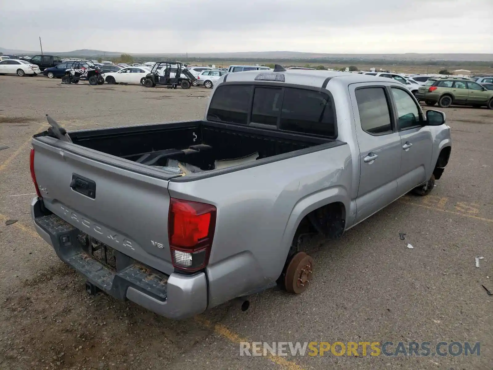 4 Photograph of a damaged car 3TMCZ5AN2KM256165 TOYOTA TACOMA 2019