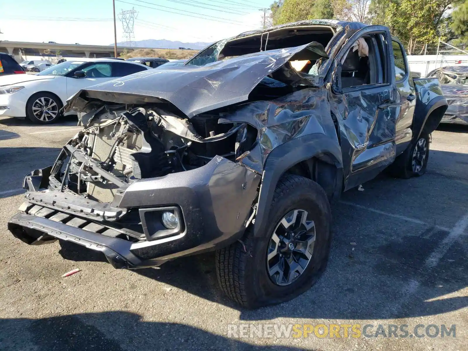 2 Photograph of a damaged car 3TMCZ5AN2KM257199 TOYOTA TACOMA 2019