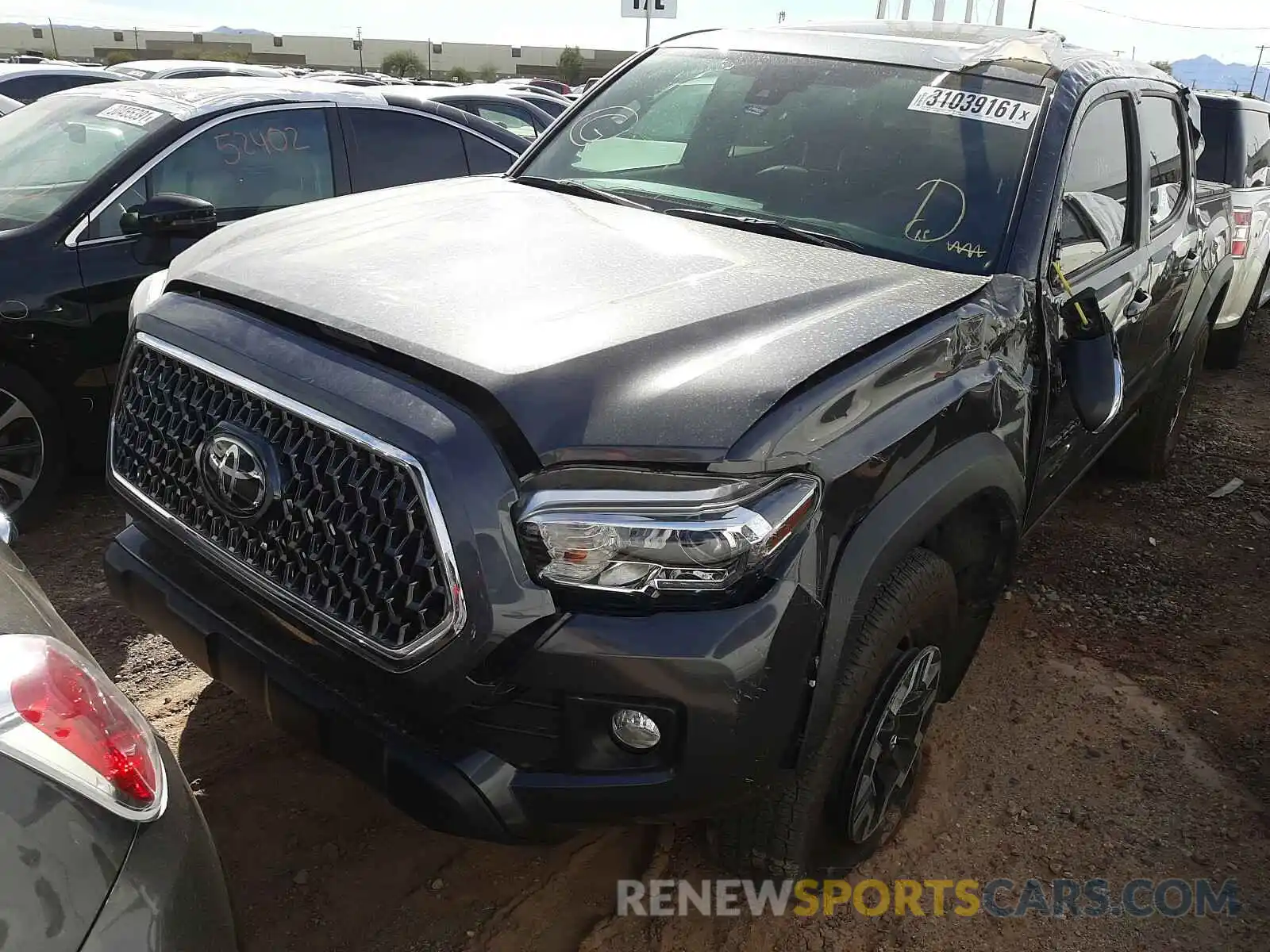 2 Photograph of a damaged car 3TMCZ5AN2KM258627 TOYOTA TACOMA 2019