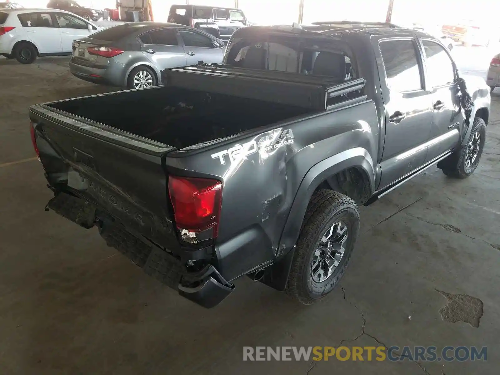 4 Photograph of a damaged car 3TMCZ5AN2KM258627 TOYOTA TACOMA 2019