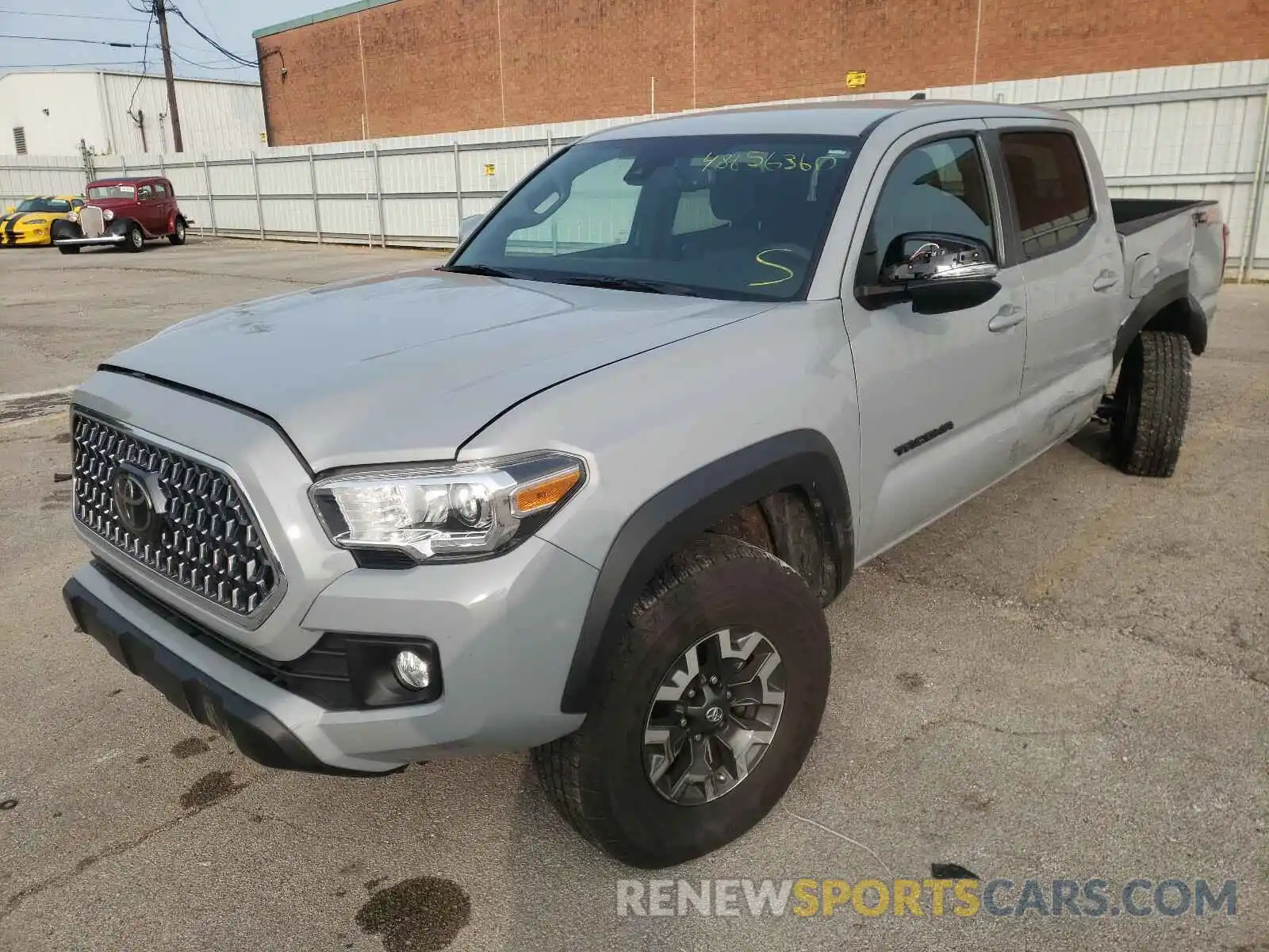 2 Photograph of a damaged car 3TMCZ5AN2KM268056 TOYOTA TACOMA 2019