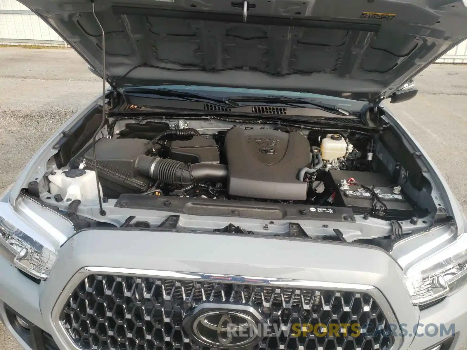 7 Photograph of a damaged car 3TMCZ5AN2KM268056 TOYOTA TACOMA 2019