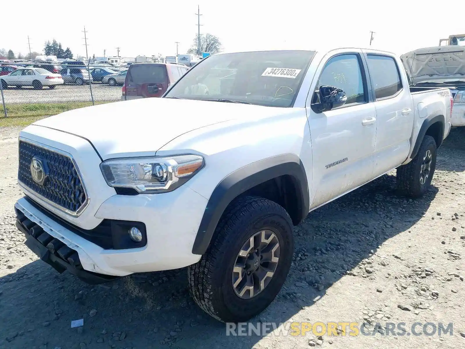 2 Photograph of a damaged car 3TMCZ5AN2KM268378 TOYOTA TACOMA 2019