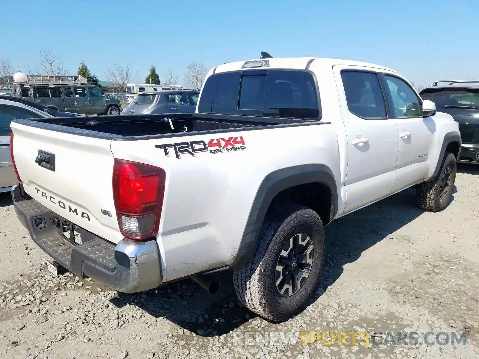 4 Photograph of a damaged car 3TMCZ5AN2KM268378 TOYOTA TACOMA 2019