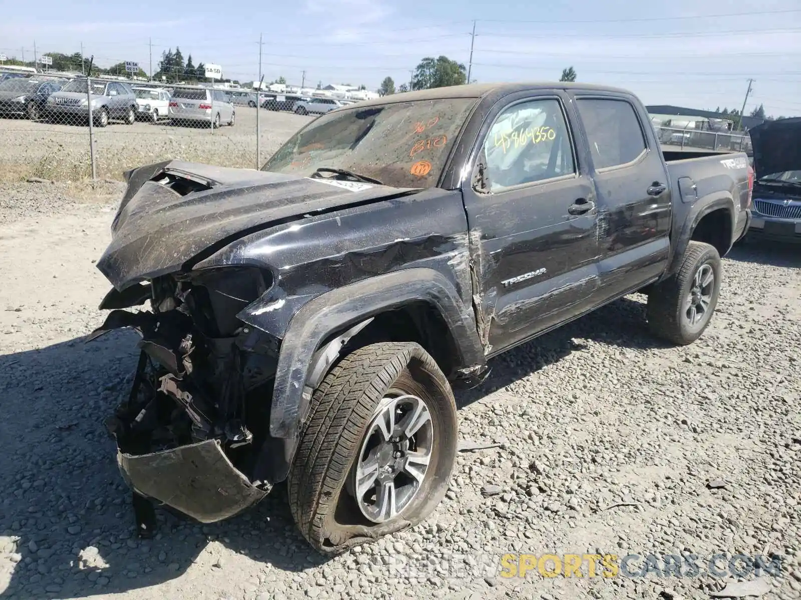 2 Photograph of a damaged car 3TMCZ5AN2KM268493 TOYOTA TACOMA 2019