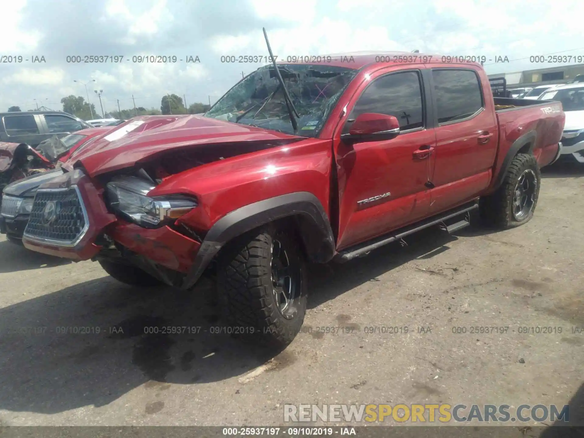 2 Photograph of a damaged car 3TMCZ5AN2KM269191 TOYOTA TACOMA 2019