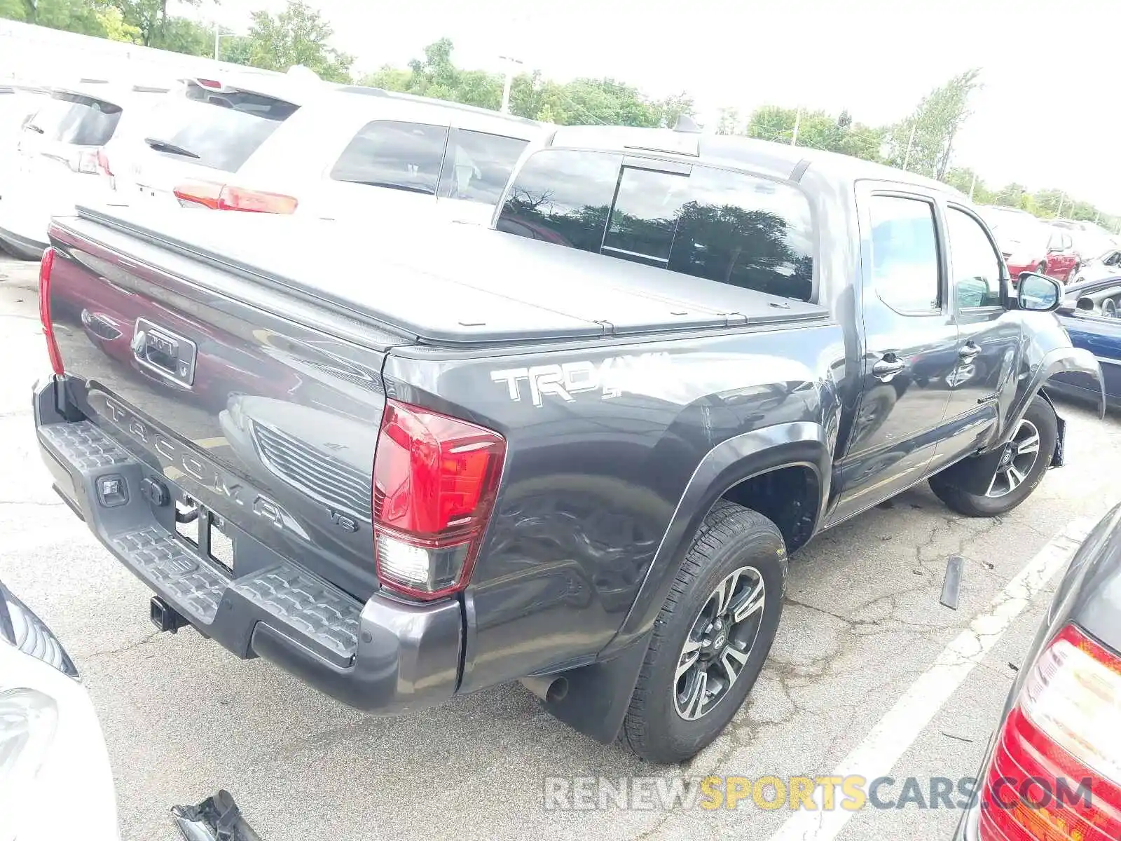 4 Photograph of a damaged car 3TMCZ5AN2KM277954 TOYOTA TACOMA 2019