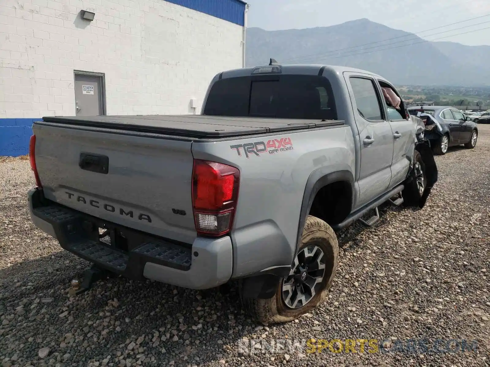 4 Photograph of a damaged car 3TMCZ5AN2KM279882 TOYOTA TACOMA 2019