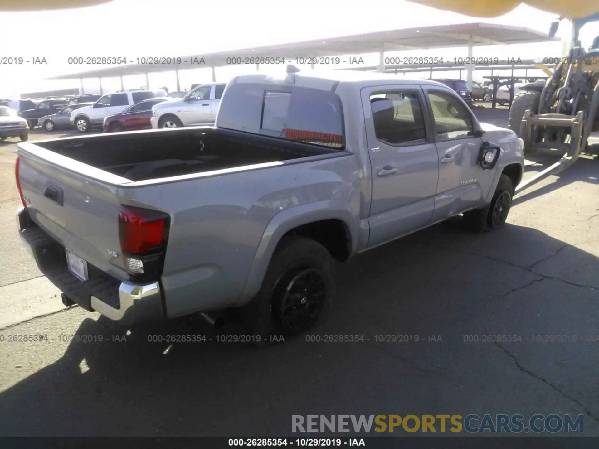 4 Photograph of a damaged car 3TMCZ5AN2KM281616 TOYOTA TACOMA 2019