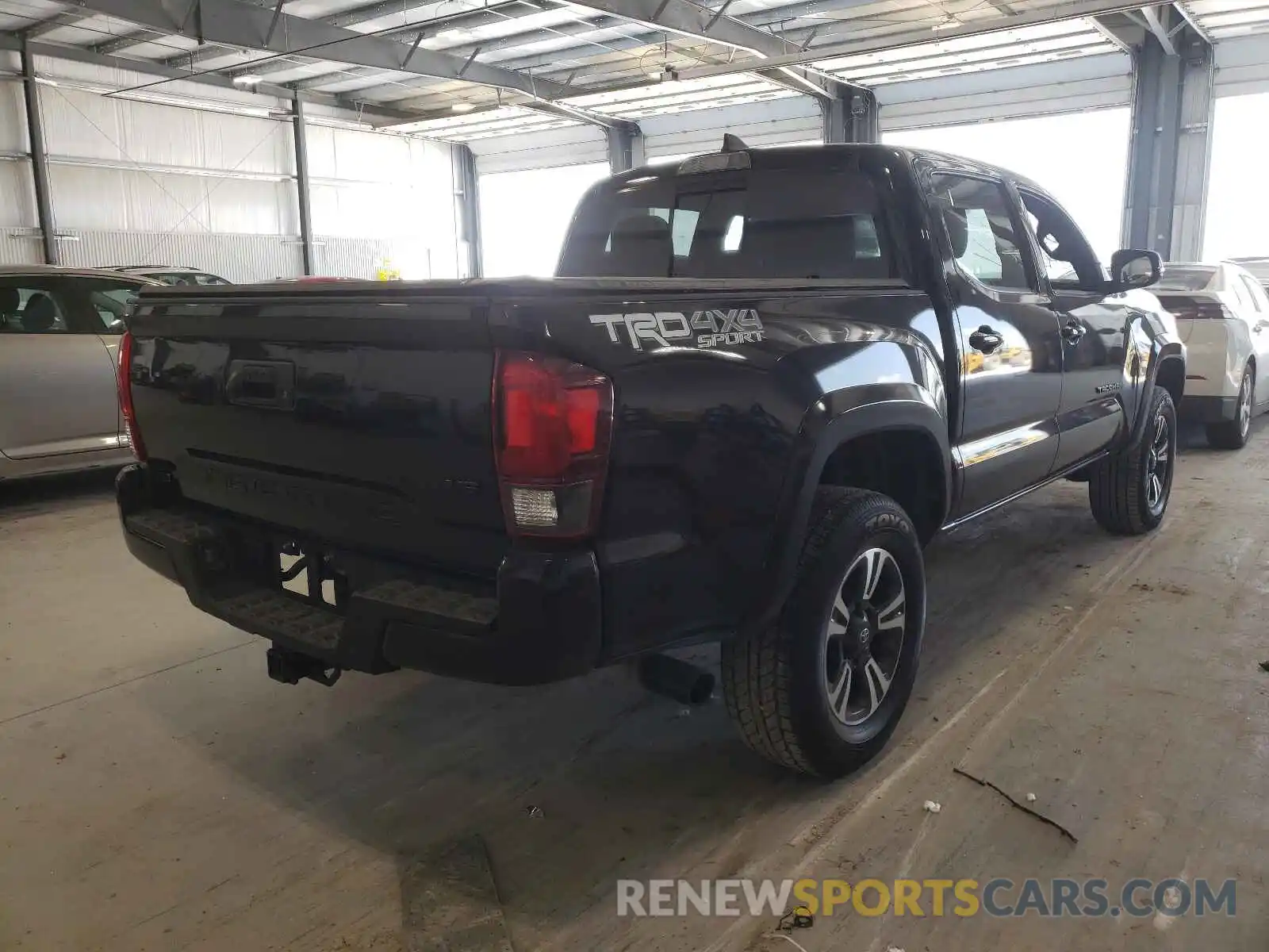 4 Photograph of a damaged car 3TMCZ5AN2KM283012 TOYOTA TACOMA 2019