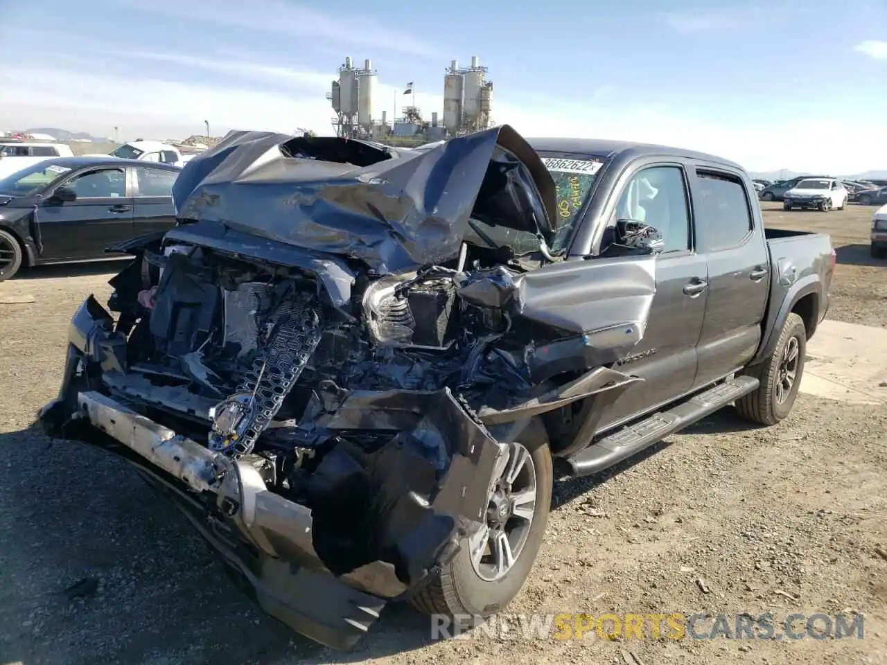 2 Photograph of a damaged car 3TMCZ5AN2KM285973 TOYOTA TACOMA 2019