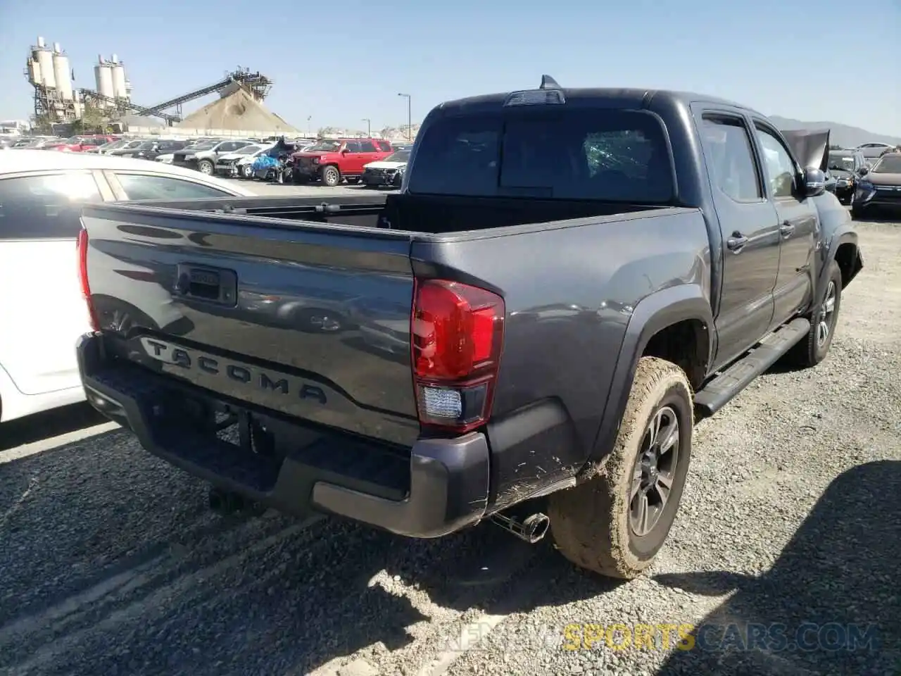 4 Photograph of a damaged car 3TMCZ5AN2KM285973 TOYOTA TACOMA 2019