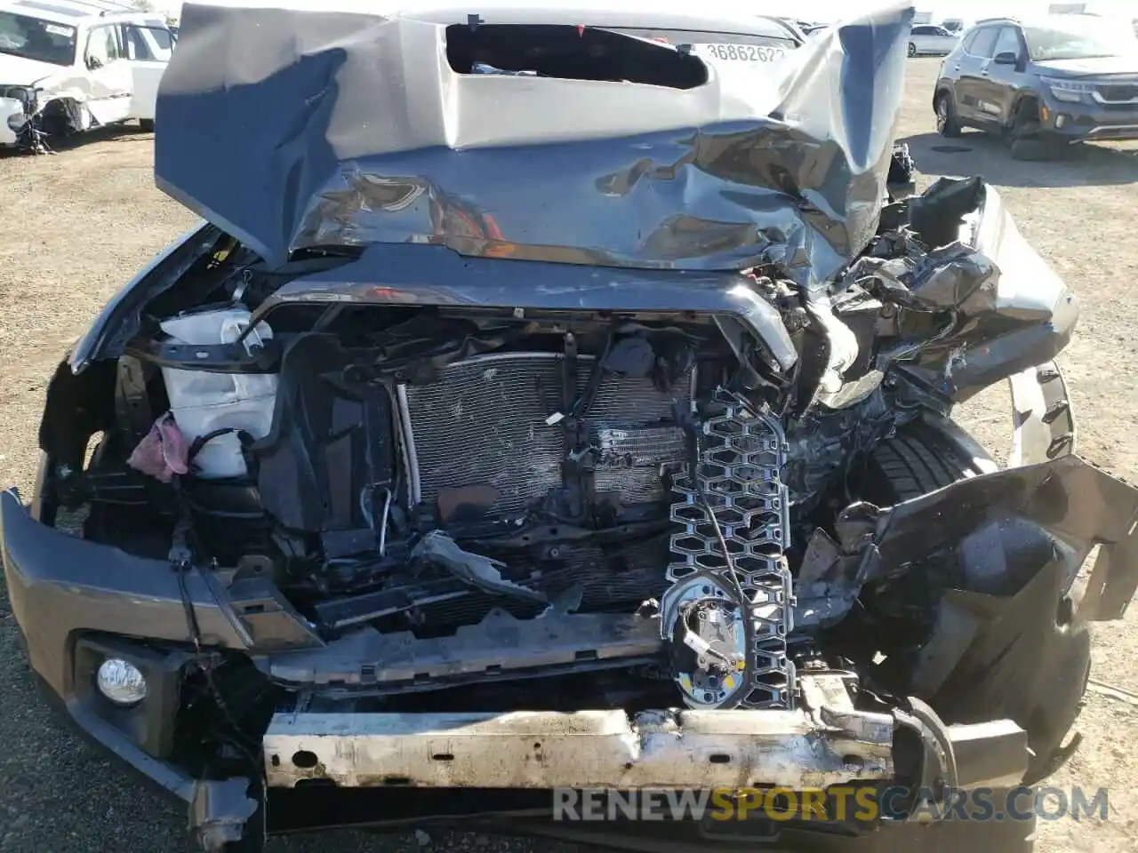 7 Photograph of a damaged car 3TMCZ5AN2KM285973 TOYOTA TACOMA 2019