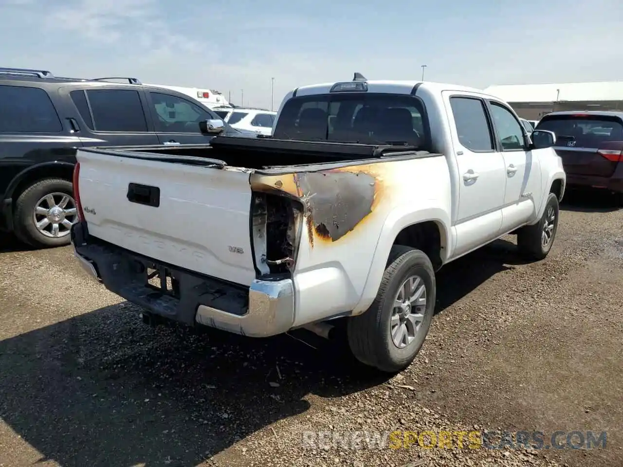 4 Photograph of a damaged car 3TMCZ5AN2KM286184 TOYOTA TACOMA 2019