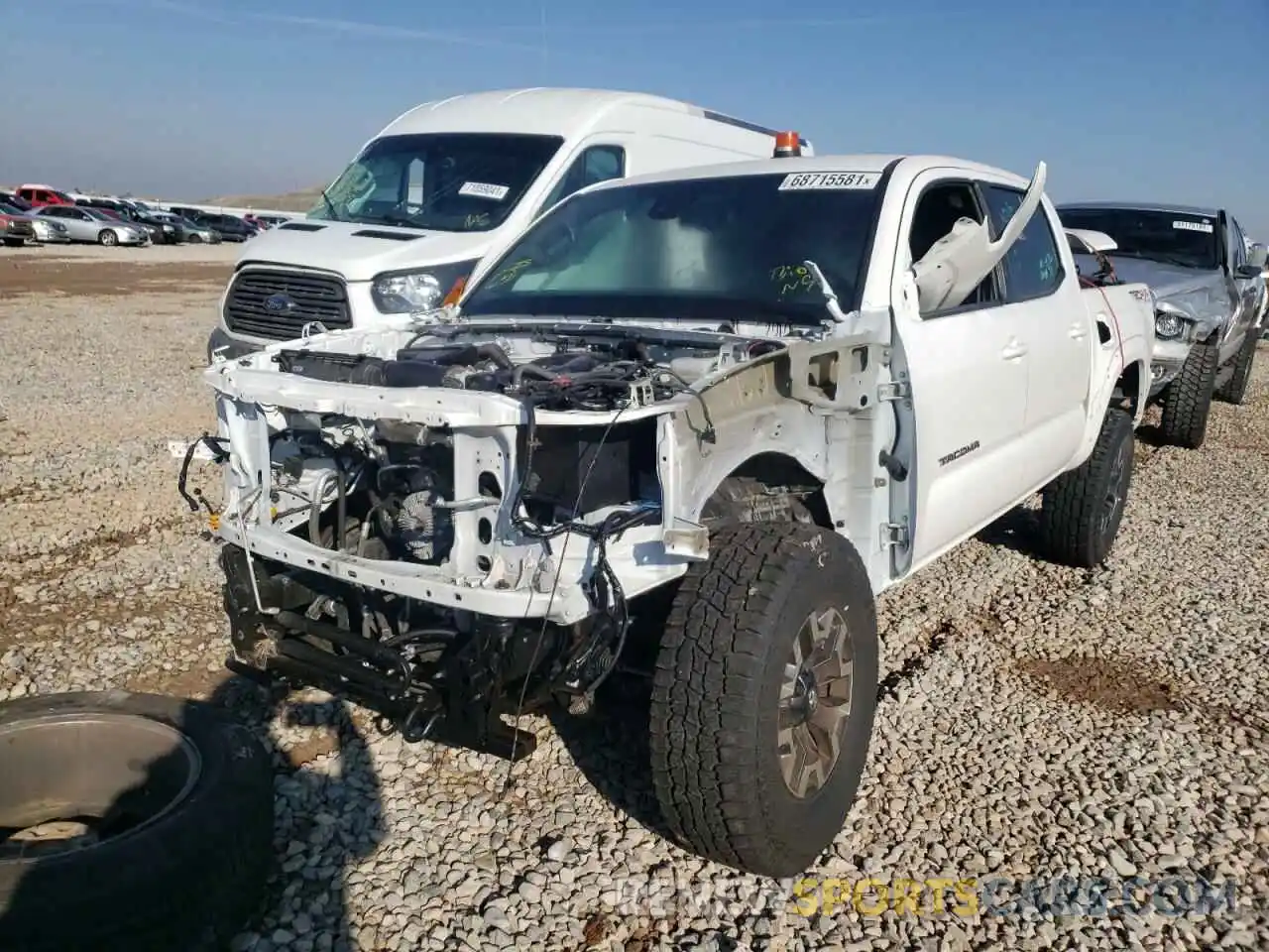 2 Photograph of a damaged car 3TMCZ5AN3KM193318 TOYOTA TACOMA 2019