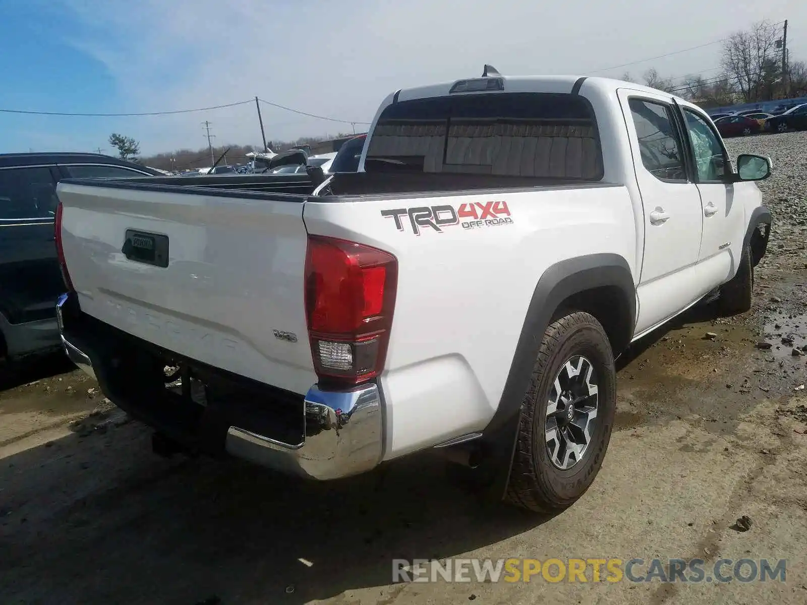 4 Photograph of a damaged car 3TMCZ5AN3KM195599 TOYOTA TACOMA 2019