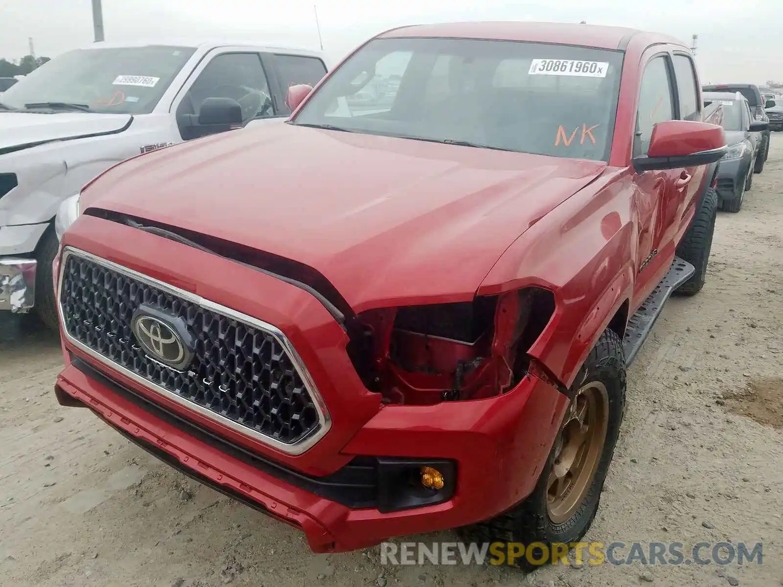 2 Photograph of a damaged car 3TMCZ5AN3KM197868 TOYOTA TACOMA 2019